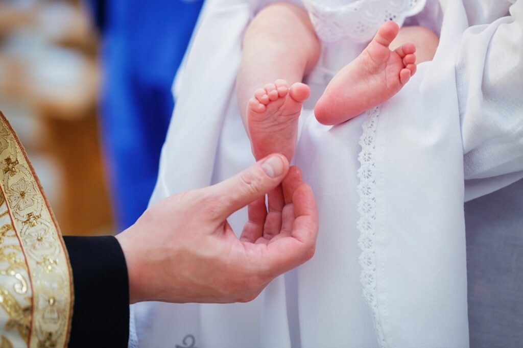 Ceremony of Christening newborn in Christian Church